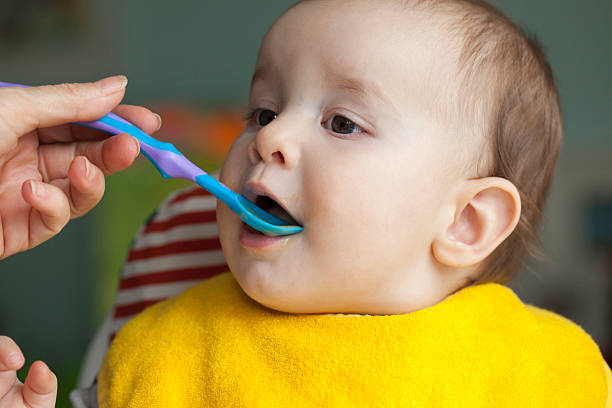 istock Baby boy eating his puree 532705961