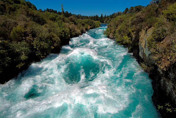 Huka Falls on the Waikato River Taupo New Zealand Huka Falls on the Waikato River Taupo New Zealand waikato river stock pictures, royalty-free photos & images