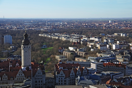 Visibility from the University of Leipzig skyscraper in Germany Saxony. In the background the new city hall, the Clara Zetkin Park, the wooden bridge of two bridges pond in the park. Recording location: 51 ° 20`17.27 \