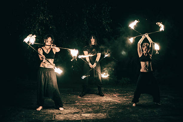 istock active girls and boys carries out tricks for fire show 532731615