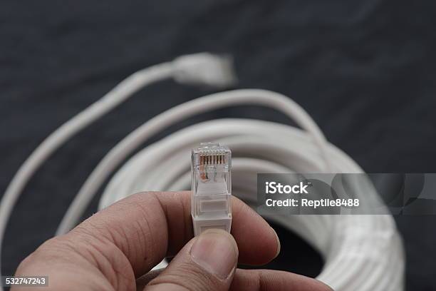 Ethernet Cable Stock Photo - Download Image Now - 2015, Advice, Attached