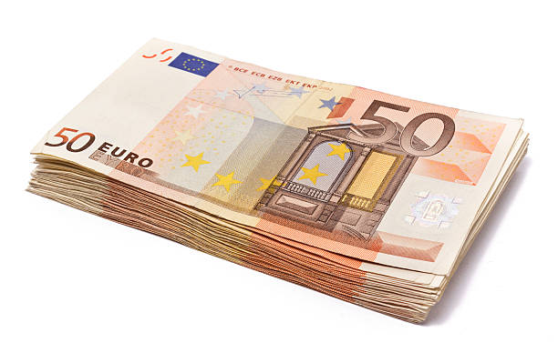 istock Pile of 50 real euro notes isolated on white 532747673
