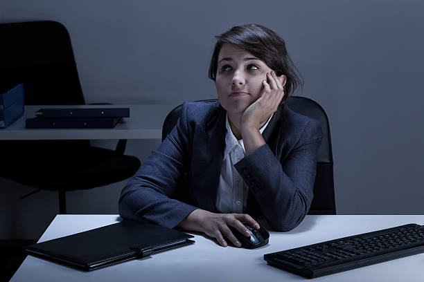 istock Bored young woman in the office 532749915