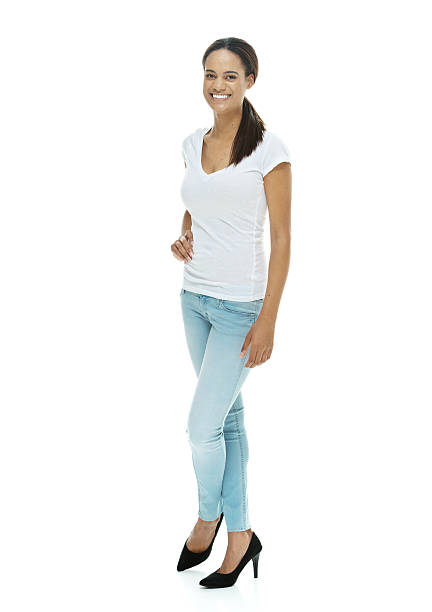 istock Happy young woman standing 532750179
