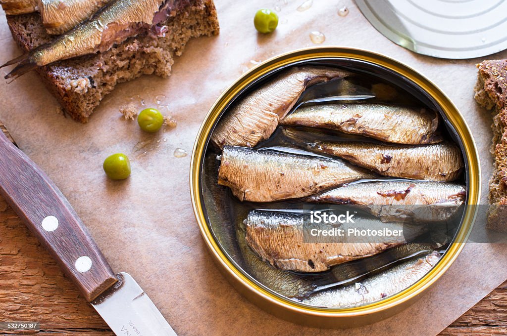 Tin can of sprats, sardines Tin can of sprats, sardines. Top view Sardine Stock Photo