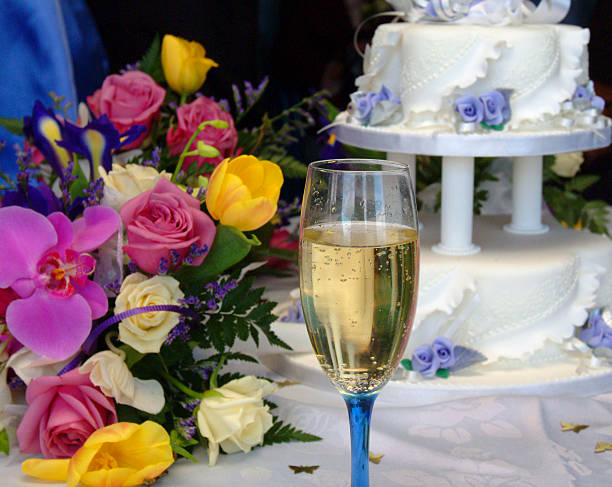 istock Champagne, flowers and Wedding Cake 532752565
