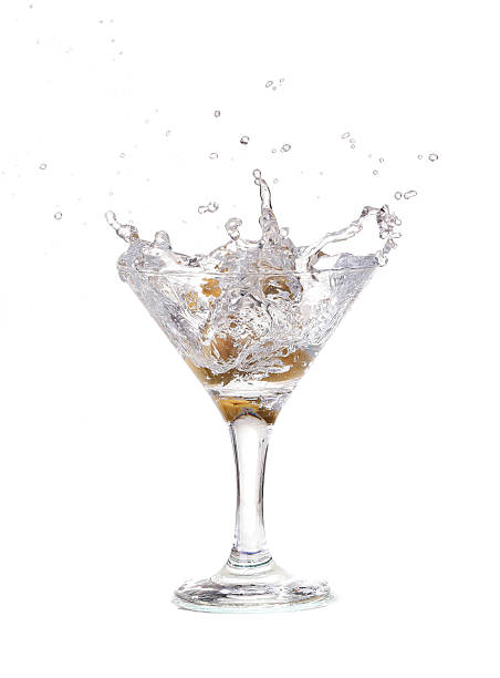 istock Splash from olive in a glass of cocktail 532769473