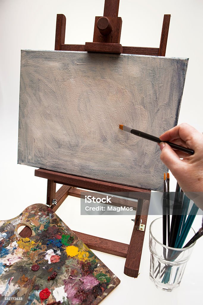 Easel and paint palette 2015 Stock Photo