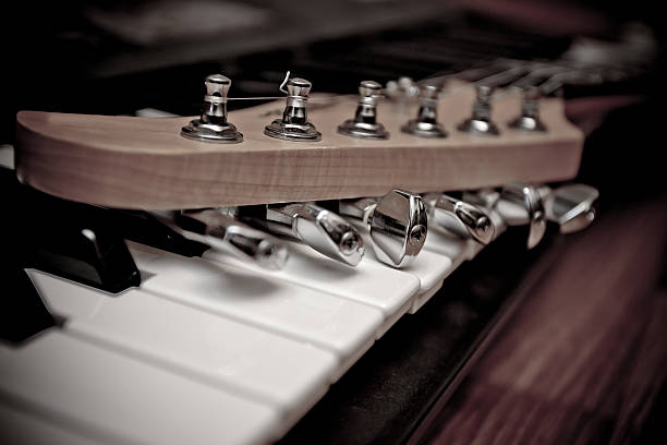 Guitar and piano Guitar and piano karlheinz böhm stock pictures, royalty-free photos & images