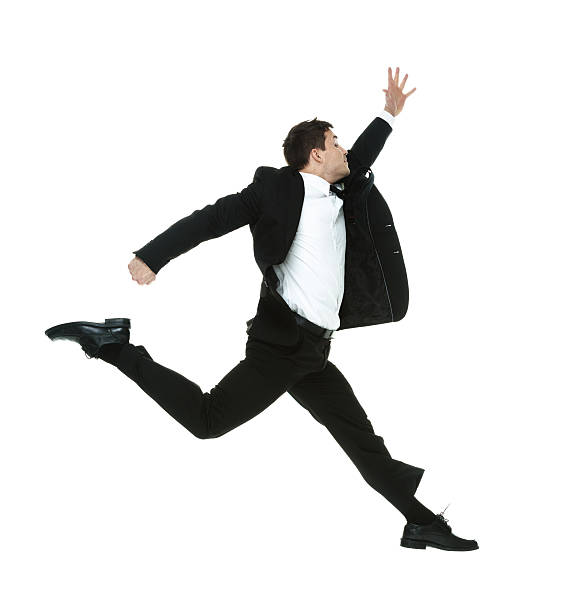 istock Businessman jumping & looking away 532773939