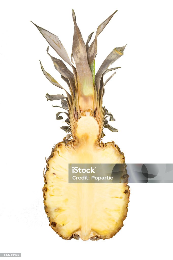 Pineapple cut in half Pineapple cut in half isolated on white background. 2015 Stock Photo