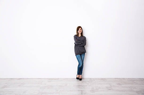 istock smiling woman with arms folded 532786713