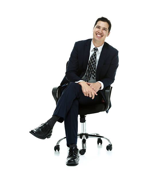 istock Happy businessman on chair & looking at camera 532787787