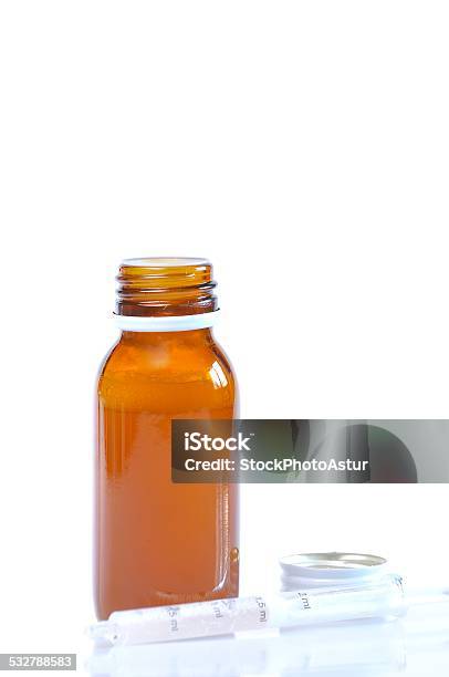 Syrup Bottle With Syringe Stock Photo - Download Image Now - 2015, Bottle, Cut Out