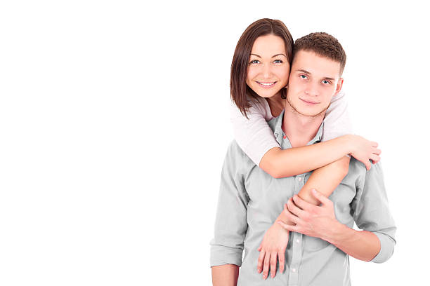 istock Young couple standing together and embracing. 532790163