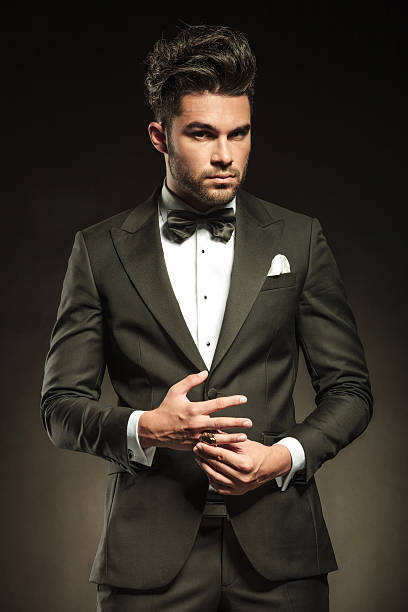 istock Elegant business man fixing his ring 532791843