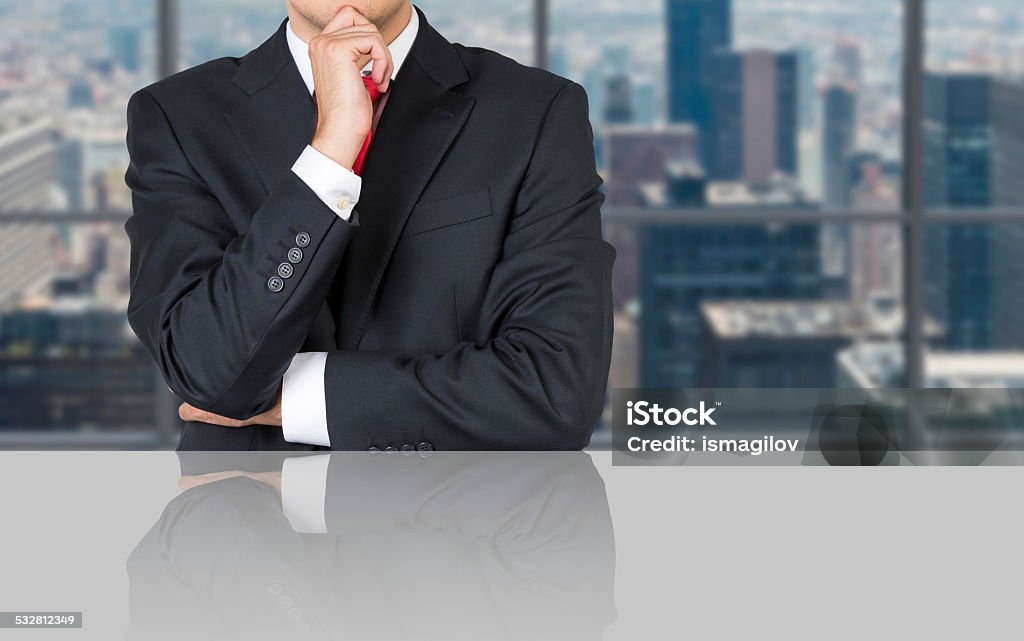 businessman thinking businessman thinking sitting in office, close up 2015 Stock Photo