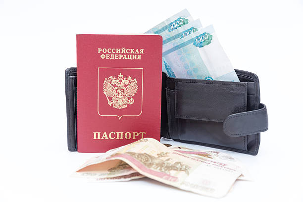 istock foreign passport and wallet with money ruble on  background 532812531