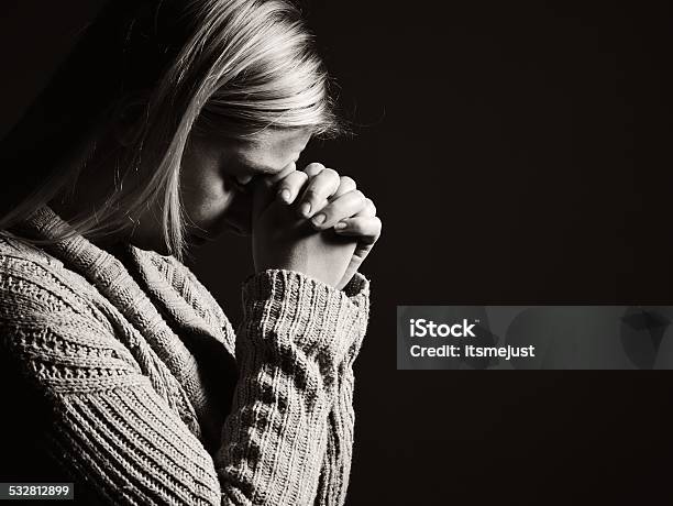 Praying Woman Stock Photo - Download Image Now - 2015, Adult, Adults Only
