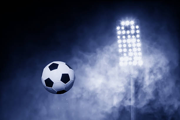 istock Soccer ball with Stadium lights 532813609
