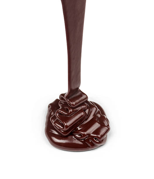 istock stream of dark chocolate isolated on white background 532814463