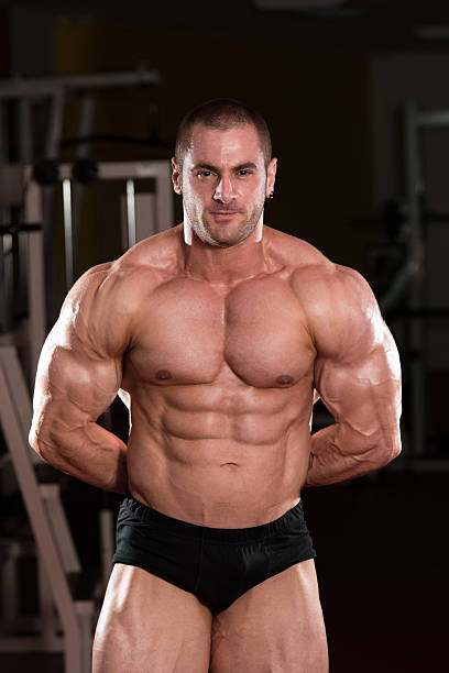 istock Serious BodyBuilder Standing In The Gym 532814547