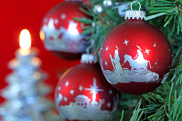 istock Holiday: Christmas Nativity Scene on red Ornaments 532816501