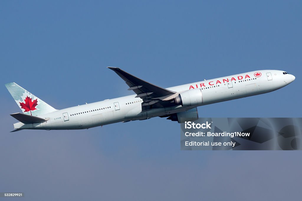 Air Canada Boeing 777-300 Frankfurt, Germany - September 17, 2014: An Air Canada Boeing 777 taking off from Frankfurt International Airport (FRA). Air Canada is the Canadian flag carrier and largest airline with some 172 planes. Air Canada Stock Photo