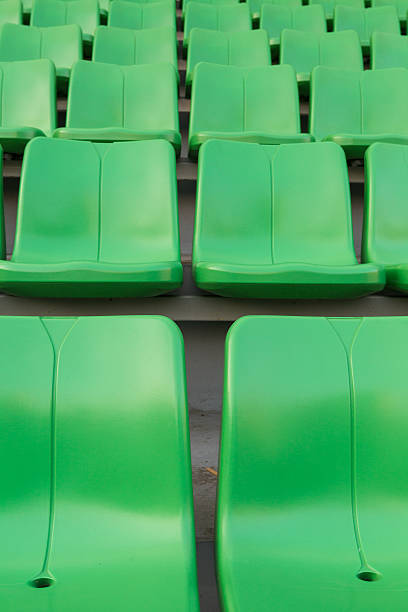 istock Sport stadium Plastic chairs in a row 532833329