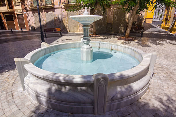 istock small fountain in a park 532833739