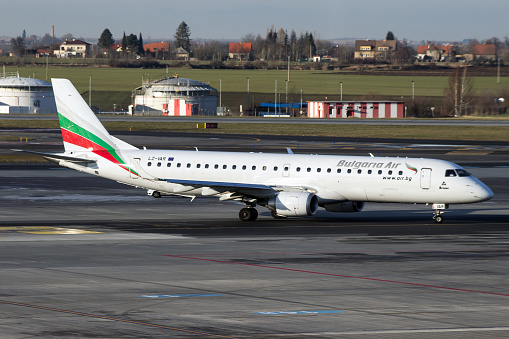 Prague, Сzech Republic - January 7, 2014: Embraer ERJ-190 Bulgaria Air taxis to take off from PRG Airport.