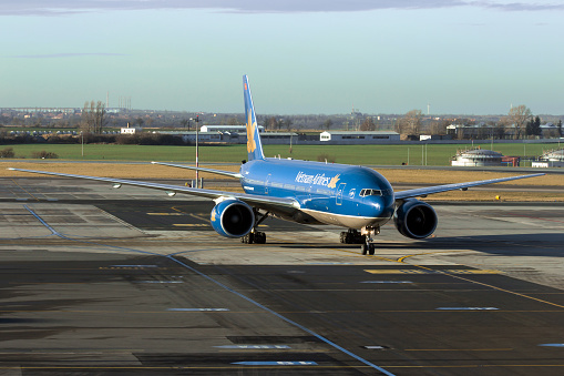 Prague, Сzech Republic - January 7, 2014: Boeing 777-2Q8/ER Vietnam Airlines taxis to terminal on PRG Airport.