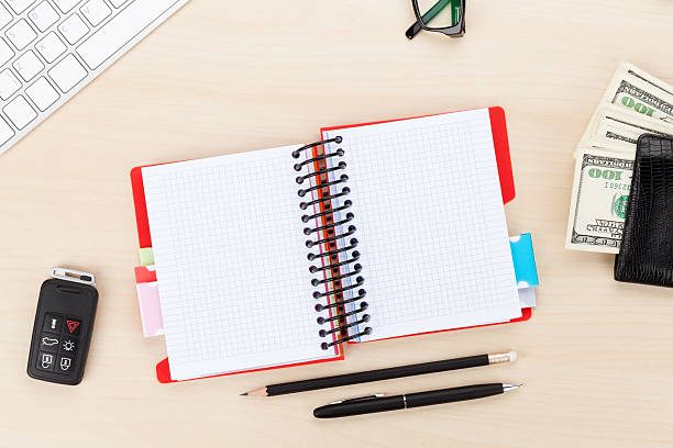 istock Office table with pc, supplies and money cash 532834765