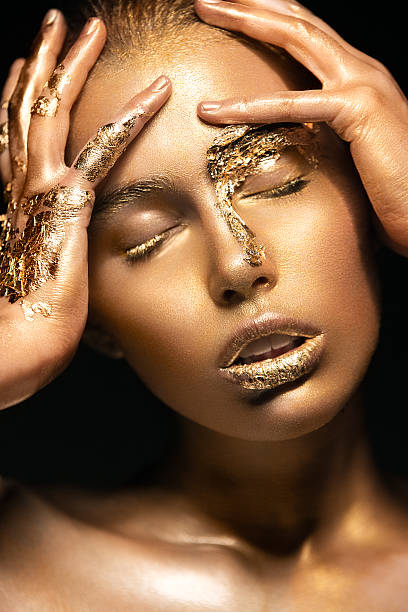 istock Girl with gold and silver skin 532835451