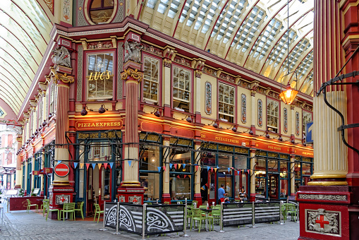 London, United Kingdom, July 1 2014: The interior of the Leadenhall Market - a covered market, one of the oldest markets in London, dating back to the 14th century in the historic centre of the City of London.