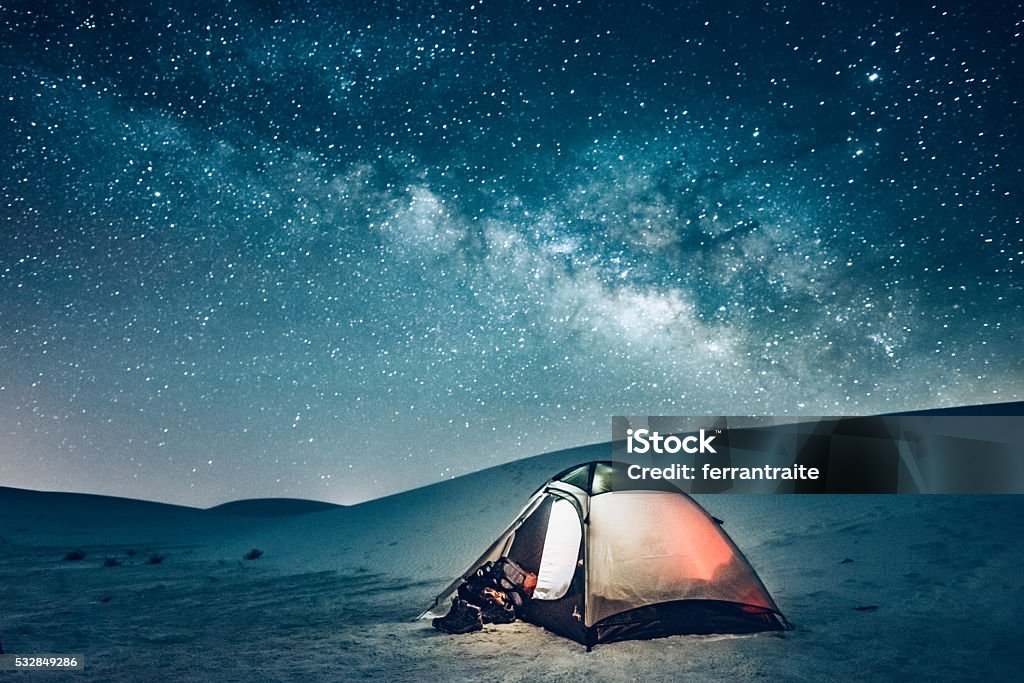 Backcountry Camping under the Stars Camping tent under the milky way at White Sands National Monument in New Mexico. Night Stock Photo