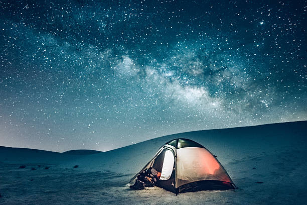 Backcountry Camping under the Stars Camping tent under the milky way at White Sands National Monument in New Mexico. tent photos stock pictures, royalty-free photos & images
