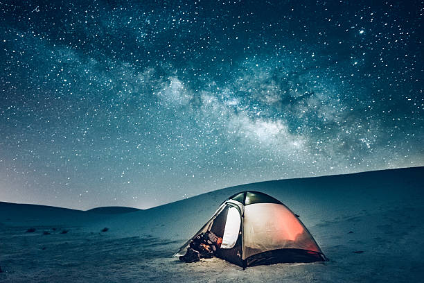 Backcountry Camping under the Stars Camping tent under the milky way at White Sands National Monument in New Mexico. never ending photos stock pictures, royalty-free photos & images
