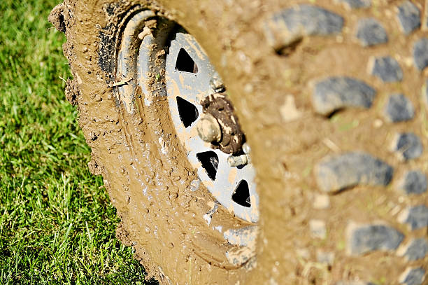 istock Off road wheel and tire full of mud 532849358