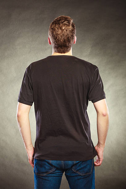 istock Back view man guy in blank shirt with copy space. 532849850