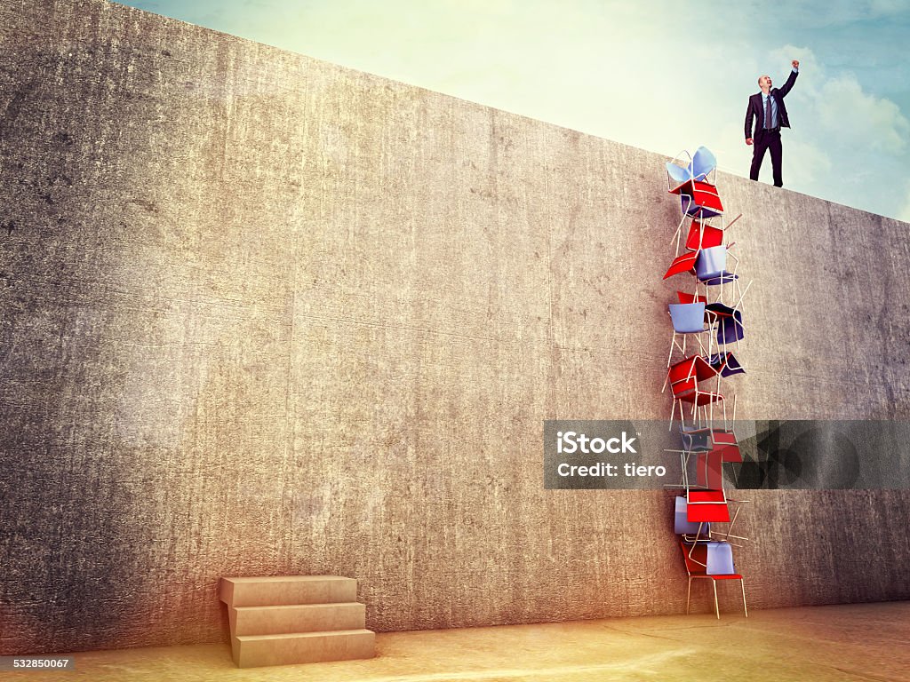 best way to success clever man try solution to climb the wall Conquering Adversity Stock Photo