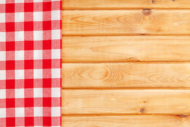 istock Red towel over wooden kitchen table 532850547