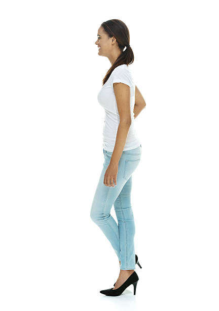 istock Toothy smile female standing & looking away 532852233