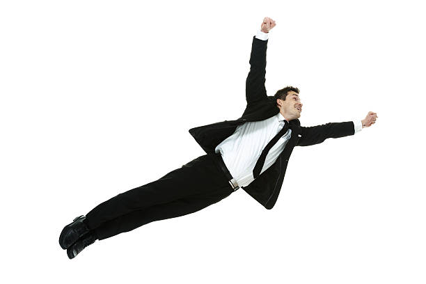 istock Cheerful businessman trying to fly 532852245