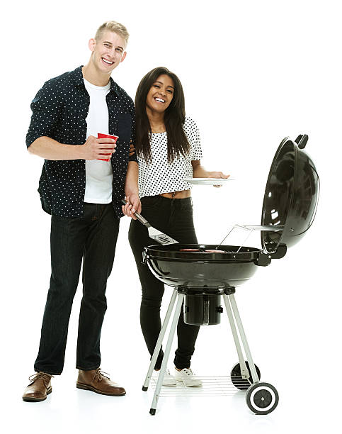 istock Couple together by the barbecue grill 532852247