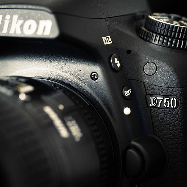 Annapolis, USA - January 15, 2015: Extreme close-up of a Nikon D750 with a lens attached and the focus on the model number.