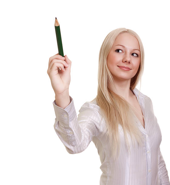 istock young businesswoman writing anything on a copy space isolated 532854089