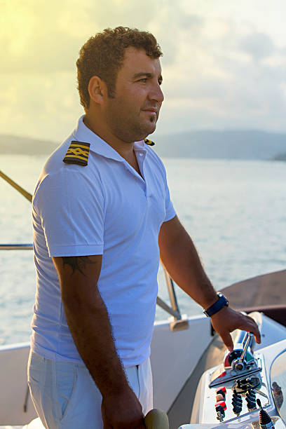 istock Captain boarding a sail boat 532854394