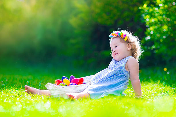istock Beautiful little girl on Easter egg hunt 532856367