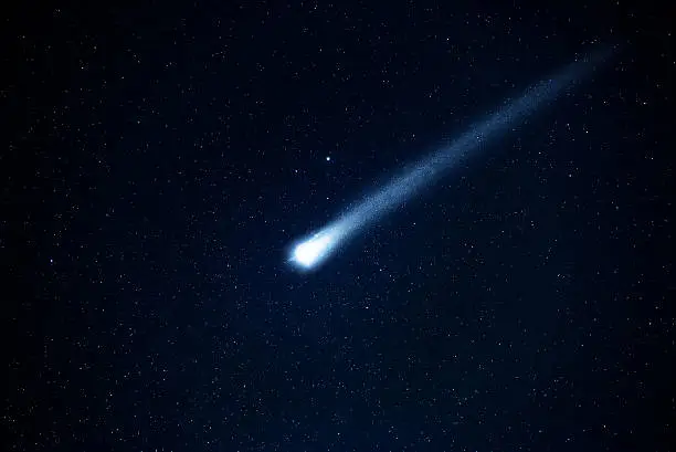 Photo of Comet in the starry sky.